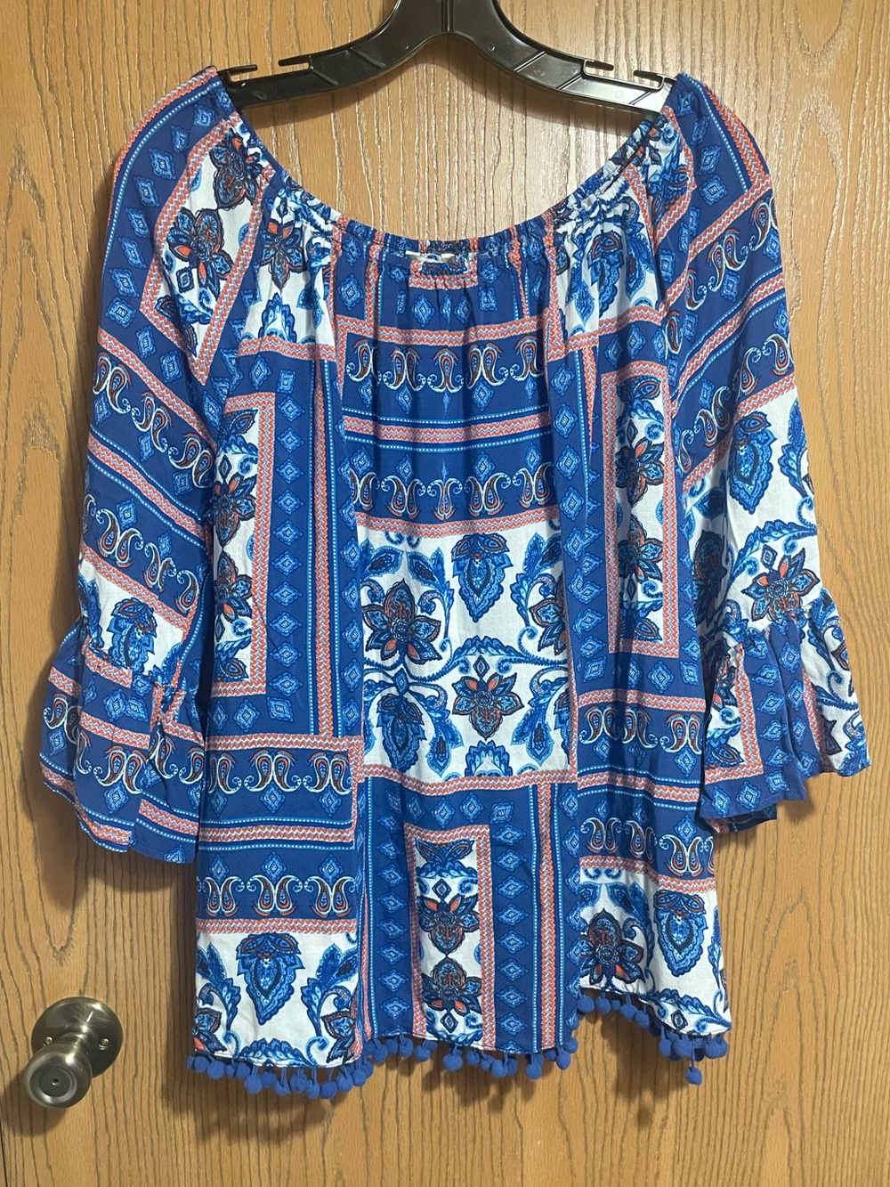 EUC Blue Peasant Top with Orange Accents and Pom-Pom Hem